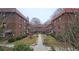 Brick apartment building with courtyard and landscaping at 692 Argonne Ne Ave # 2, Atlanta, GA 30308