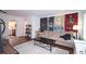 Bright living room with hardwood floors, comfy sofa, and a view of the kitchen at 692 Argonne Ne Ave # 2, Atlanta, GA 30308