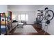 Living room featuring hardwood floors, a cozy sitting area, and a wall-mounted bicycle at 692 Argonne Ne Ave # 2, Atlanta, GA 30308