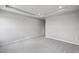 Spacious bedroom featuring a tray ceiling, recessed lighting, and neutral carpeting at 14 Cambridge Ln, Dallas, GA 30157