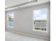 Bright bedroom with large windows offering abundant natural light and neighborhood views at 14 Cambridge Ln, Dallas, GA 30157