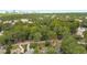 Property features a tree-lined street and distant city skyline at 1417 Sheridan Ne Rd, Atlanta, GA 30324