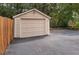 Single car garage with light beige exterior and asphalt driveway at 1417 Sheridan Ne Rd, Atlanta, GA 30324