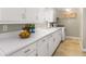 Kitchen with white cabinets and ample counter space at 1417 Sheridan Ne Rd, Atlanta, GA 30324