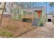 Cute green house with deck, steps, and landscaping at 1783 Pennington Se Pl, Atlanta, GA 30316