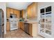 Cozy kitchen featuring wood cabinets and modern appliances at 1783 Pennington Se Pl, Atlanta, GA 30316