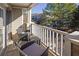 Private balcony with outdoor seating and views of the community at 2700 Pine Tree Ne Rd # 2306, Atlanta, GA 30324