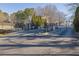 Gated community entrance with wrought iron fencing and a controlled access point at 2700 Pine Tree Ne Rd # 2306, Atlanta, GA 30324