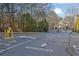 Gated entrance to the residential community with visitor parking at 2700 Pine Tree Ne Rd # 2306, Atlanta, GA 30324