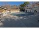Large community pool with surrounding patio and clubhouse at 2700 Pine Tree Ne Rd # 2306, Atlanta, GA 30324