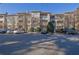 Exterior of a multi-story condominium building with ample parking space at 2700 Pine Tree Ne Rd # 2306, Atlanta, GA 30324