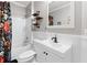 Updated bathroom with a floral shower curtain and modern vanity at 4100 Paces Se Walk # 2304, Atlanta, GA 30339