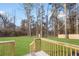 Large backyard with deck and wood fence at 771 N Burnt Hickory N Rd, Douglasville, GA 30134