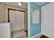 Basement bathroom with shower stall, toilet and vanity at 1422 Hillside Dr, Grayson, GA 30017