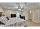 Large basement bedroom with king-size bed and office area at 1422 Hillside Dr, Grayson, GA 30017