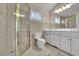 Clean bathroom with double vanity and walk-in shower at 1422 Hillside Dr, Grayson, GA 30017