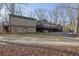 House back view with large deck and additional building at 1422 Hillside Dr, Grayson, GA 30017