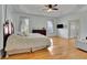 Spacious main bedroom with hardwood floors, large windows, and an en-suite bathroom at 1422 Hillside Dr, Grayson, GA 30017