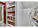 Spacious pantry with various storage options for dry goods at 1422 Hillside Dr, Grayson, GA 30017