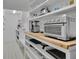 Well-organized pantry with ample shelving and counter space at 1422 Hillside Dr, Grayson, GA 30017