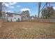 Large backyard with wooden privacy fence at 1822 Avon Sw Ave, Atlanta, GA 30311