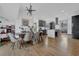 Open-concept dining room with modern light fixture and views of the stylish gourmet kitchen at 1822 Avon Sw Ave, Atlanta, GA 30311