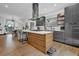 Modern kitchen with stainless steel appliances and an island at 1822 Avon Sw Ave, Atlanta, GA 30311