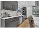 Sleek kitchen with gray cabinets and white countertops at 1822 Avon Sw Ave, Atlanta, GA 30311