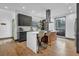 Contemporary kitchen featuring a large island and marble countertops at 1822 Avon Sw Ave, Atlanta, GA 30311