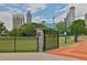 Another view of the Centennial Olympic Park entrance with a metal gate and stone pillars at 1822 Avon Sw Ave, Atlanta, GA 30311