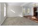 Bright dining room with hardwood floors and crown molding at 3164 Sw Wolf Club Sw Dr, Atlanta, GA 30349