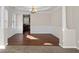 Bright dining room with hardwood floors and crown molding at 3164 Sw Wolf Club Sw Dr, Atlanta, GA 30349