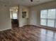 Inviting living room showcasing hardwood floors and an open layout to the kitchen at 4019 Kingsbrook Blvd, Decatur, GA 30034