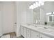 Bright bathroom with double vanity and separate shower at 559 Ransom Way, Stockbridge, GA 30281