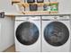 Laundry room with side-by-side washer and dryer at 559 Ransom Way, Stockbridge, GA 30281