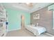 Light teal bedroom with built-in shelves and a daybed at 125 Hidden Creek Dr, Canton, GA 30114