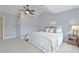 Main bedroom with gray walls and a king-size bed at 125 Hidden Creek Dr, Canton, GA 30114