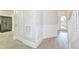 Bright entryway with wood flooring and staircase at 125 Hidden Creek Dr, Canton, GA 30114