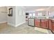 Kitchen with dark wood cabinets and granite countertops at 125 Hidden Creek Dr, Canton, GA 30114