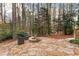 Beautiful flagstone patio with a fire pit perfect for entertaining at 2085 Melrose Trce, Cumming, GA 30041