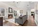 Bright living room with hardwood floors and fireplace at 2085 Melrose Trce, Cumming, GA 30041