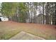 Wooded area behind the property providing privacy at 3284 Pennington Dr, Lithonia, GA 30038