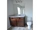 Bathroom with granite vanity and tile floor at 3284 Pennington Dr, Lithonia, GA 30038