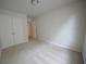 Spacious bedroom with double doors leading to closet at 3284 Pennington Dr, Lithonia, GA 30038