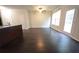 Bright dining area with hardwood floors and view to backyard at 3284 Pennington Dr, Lithonia, GA 30038