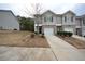 Townhome community with two-story homes and paved driveways at 3284 Pennington Dr, Lithonia, GA 30038