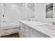 Bright bathroom features a double vanity, soaking tub, and white subway tile at 3215 Concord Cir, Smyrna, GA 30080
