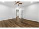 Spacious bedroom features vinyl floors and a door leading to connecting rooms at 3215 Concord Cir, Smyrna, GA 30080