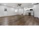 Bright and open concept with vinyl flooring, stainless steel appliances, ceiling fan, and neutral paint at 3215 Concord Cir, Smyrna, GA 30080