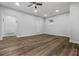 Open living room features modern floors and ample natural light at 3215 Concord Cir, Smyrna, GA 30080